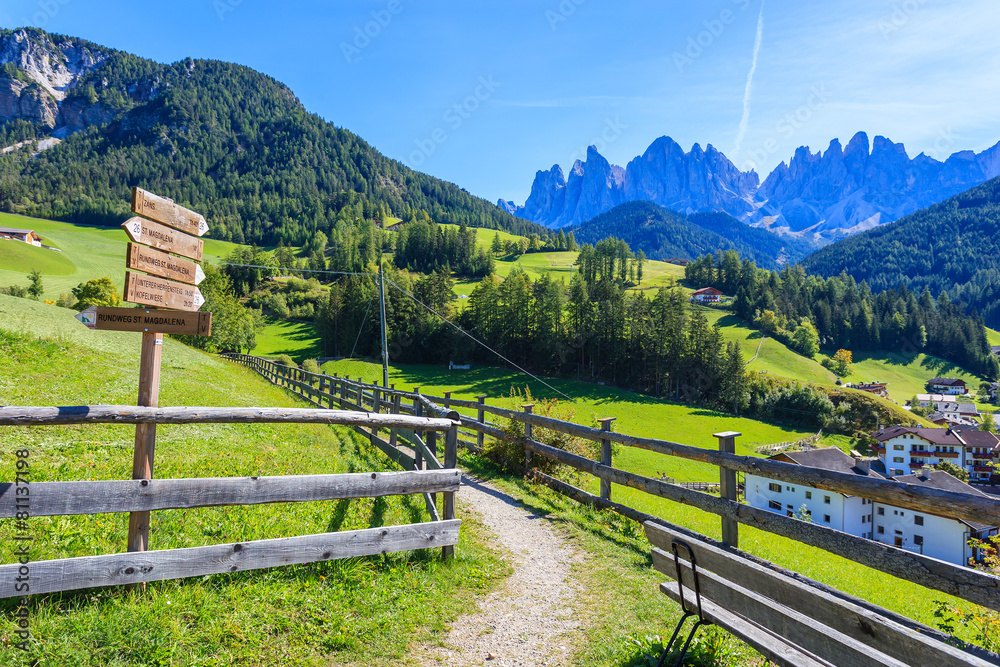 Walking path in Val di Funes alpine valley, Dolomites Mountains