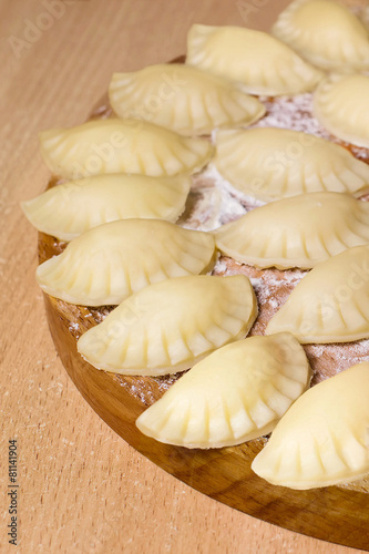Raw russian dumplings with cheese