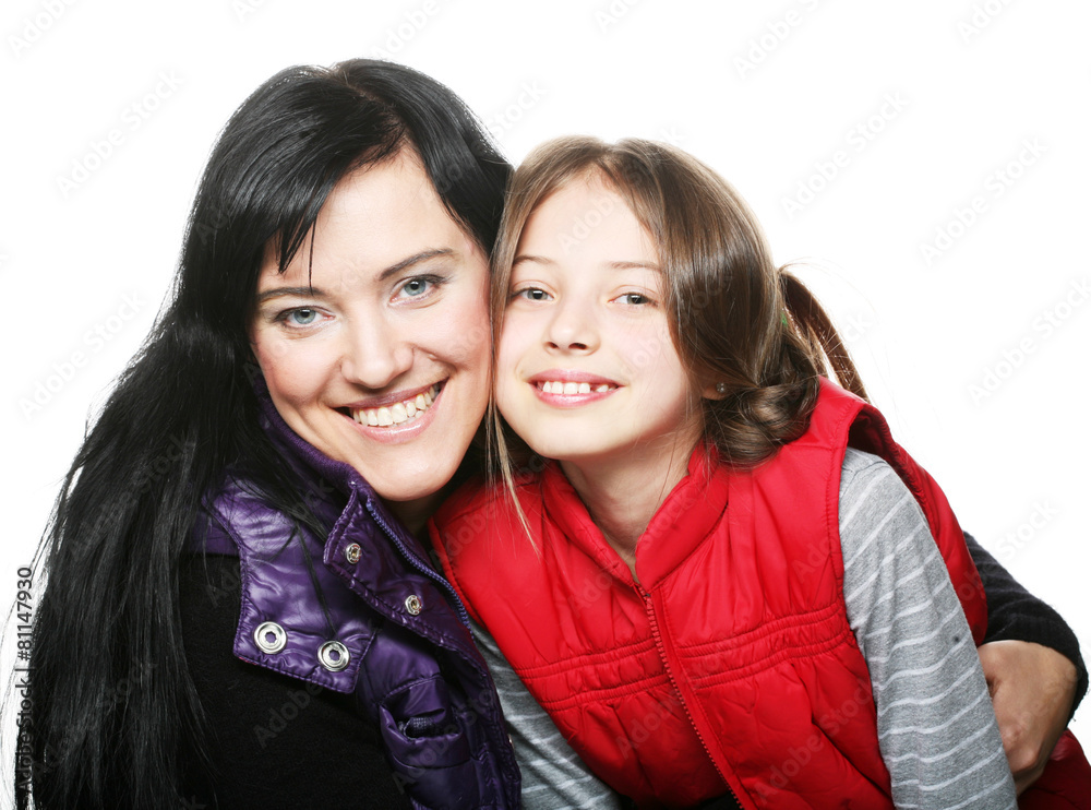 mother and her daughter smiling at the camera mother and her daughter smiling at the camera