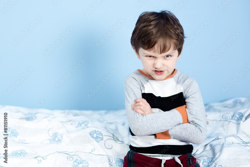 Naughty little boy. Angry little boy frowned Naughty little boy. Angry little boy frowned