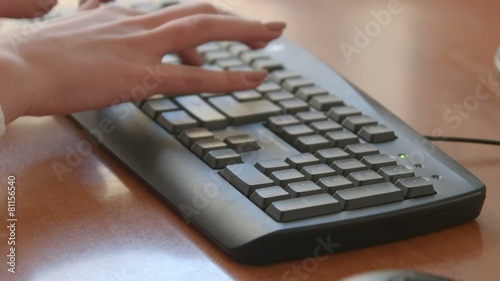 Female Hands Typing on Computer Keyboard