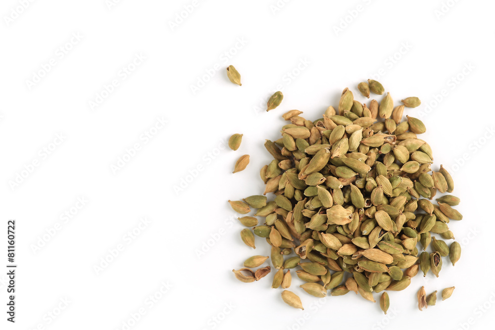 Pile of green cardamom seeds isolated on white background Pile of green cardamom seeds isolated on white background