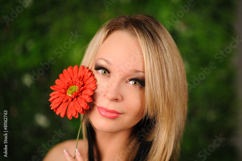 girl with red flower