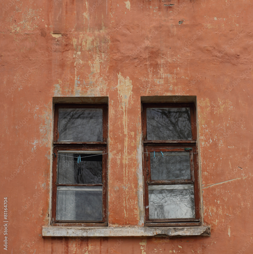 Windows on the wall of an old house