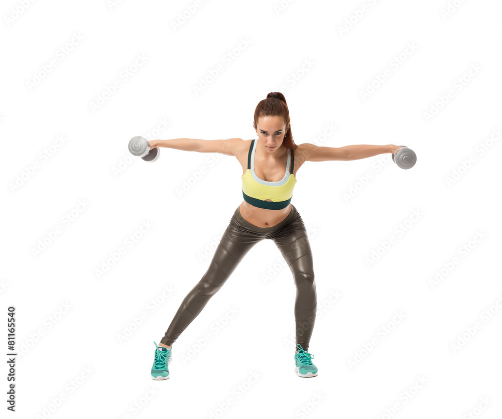 Harmonous girl training with dumbbells at camera Harmonous girl training with dumbbells at camera