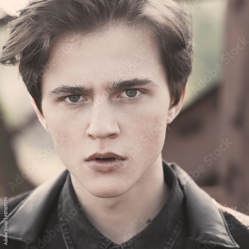 Face of a beautiful young man
