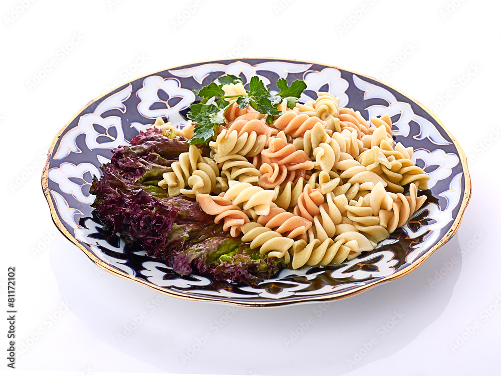 Penne pasta with sauce, cheese and basil, selective focus