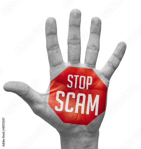 Stop Scam Concept on Open Hand.