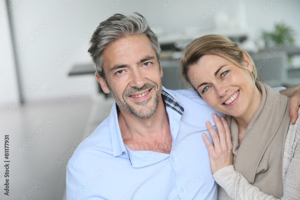 Portrait of mature couple relaxing at home Portrait of mature couple relaxing at home