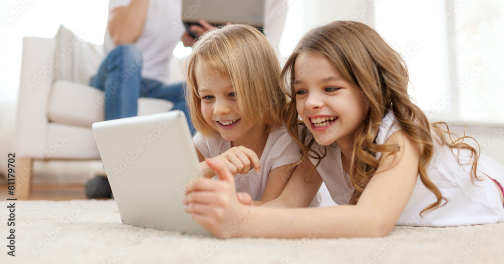 smiling sister with tablet pc and parents on back smiling sister with tablet pc and parents on back