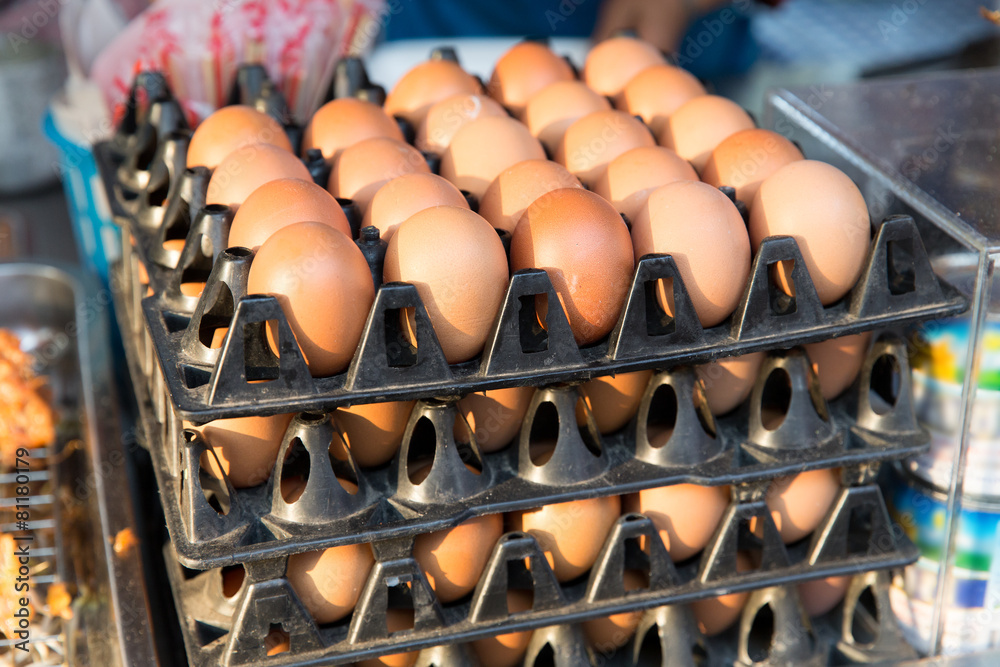 fresh eggs on tray at asian street market
