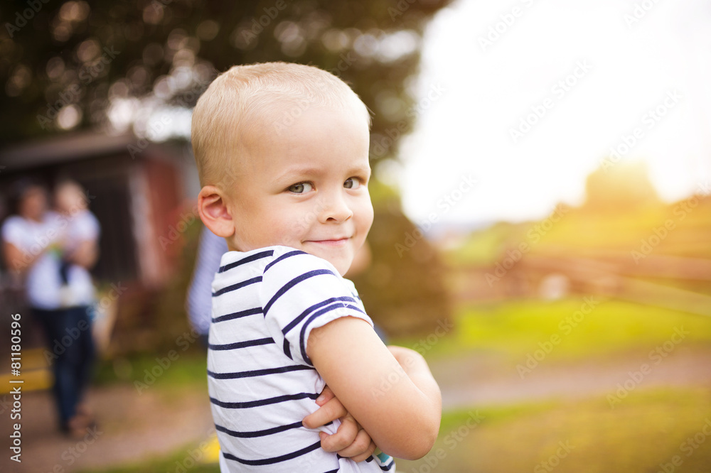 Little boy waiting at the station for his train. Little boy waiting at the station for his train.