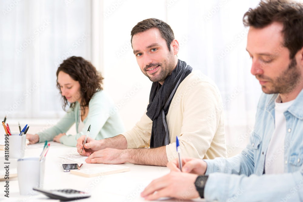 Young attractive student during classes