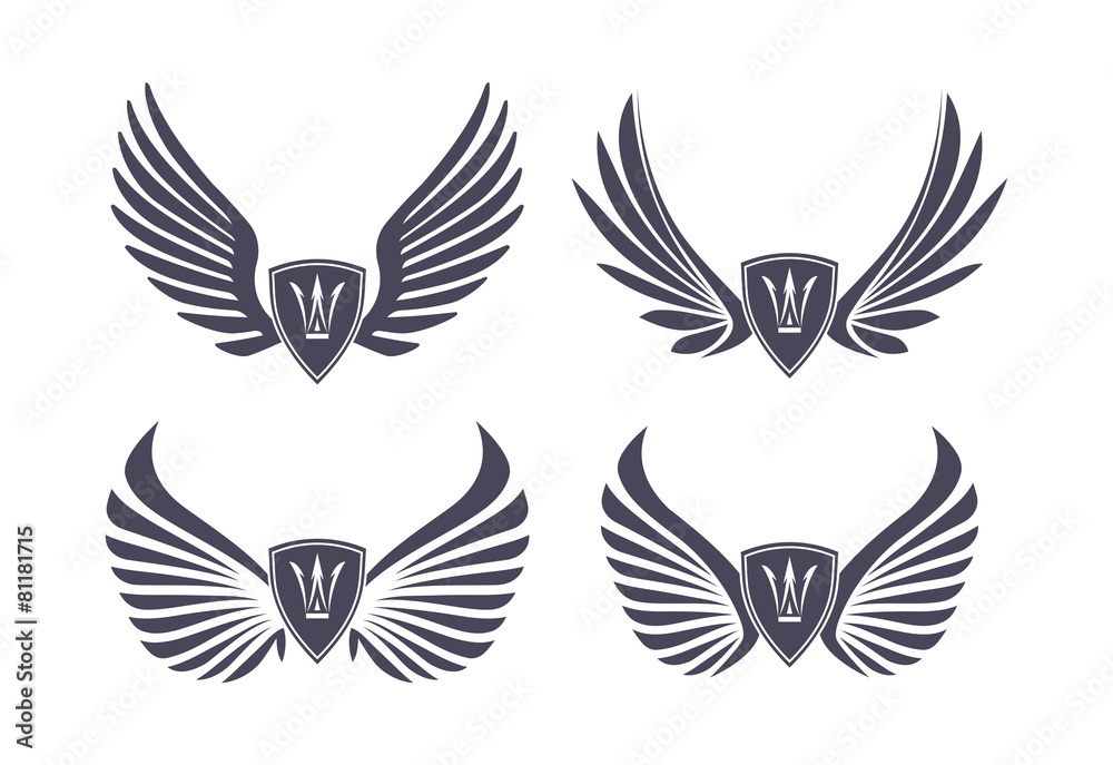 Obraz premium Set of 4 pair of stylish decorative vector wings with shields an