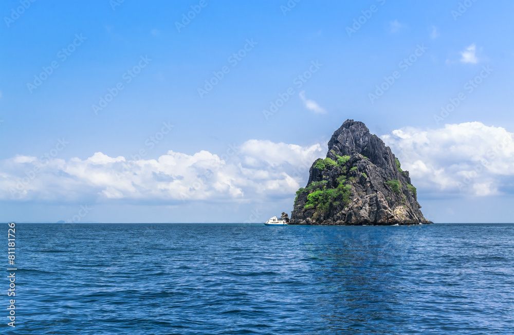 Paradise island with yacht
