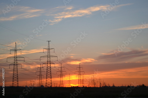 Electric power transmission lines at sunset. © konstan