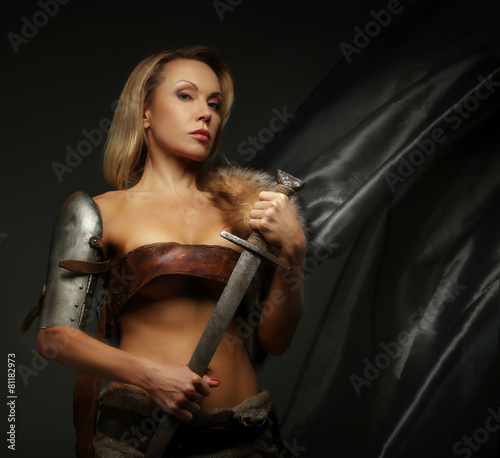 Middle age female holding sword
