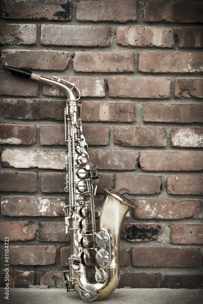 Naklejka premium Saxophone Brick Wall