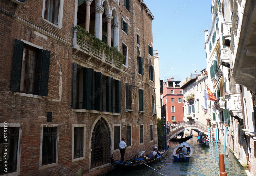 Venice, Italy - Gondolier and historic tenements