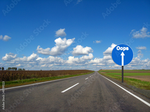 asphalted road and the blue sky photo