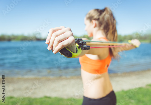 woman training with elastics