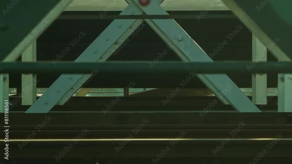Train passing on bridge, close up, London