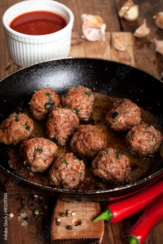 Fried meatballs on the pan