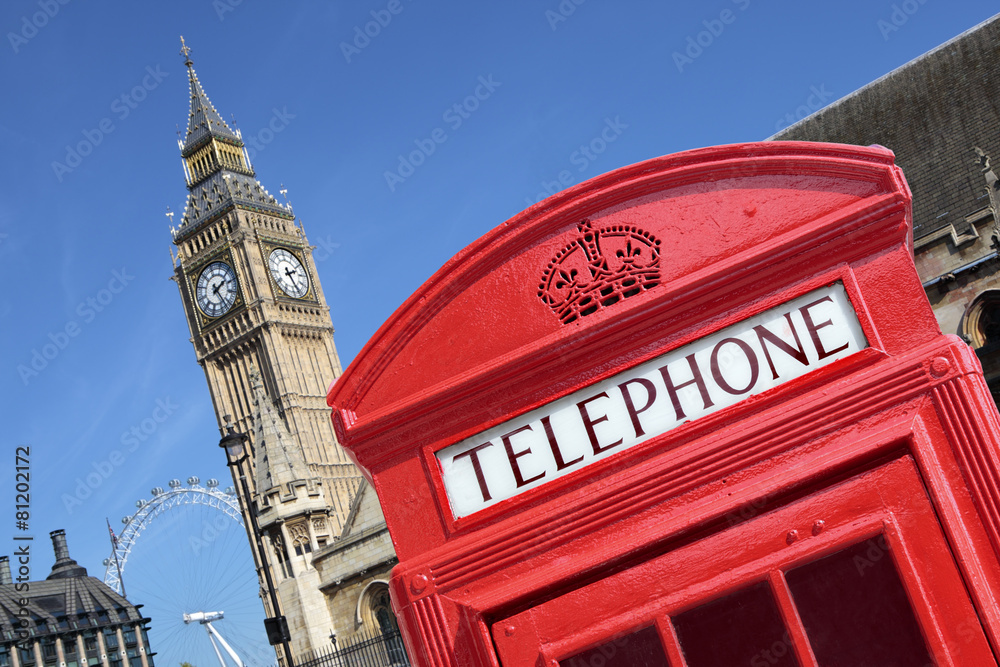 Fototapeta London red telephone box booth with westminster houses of parliament building and Big Ben clock tower in the background photo