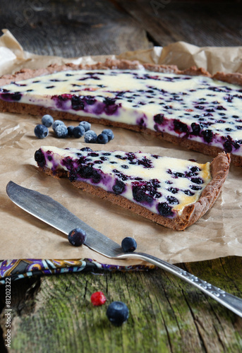 tart with blueberries and cream