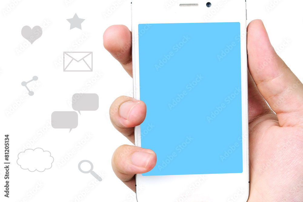 Smart phone in hand on social media icons background Smart phone in hand on social media icons background