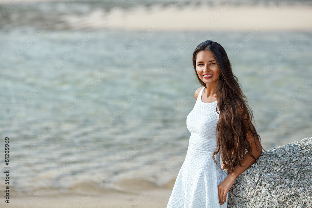 beautiful brunette portrait on beach