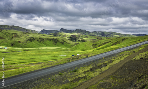 Icelandic mountain landscapes with asphalt road