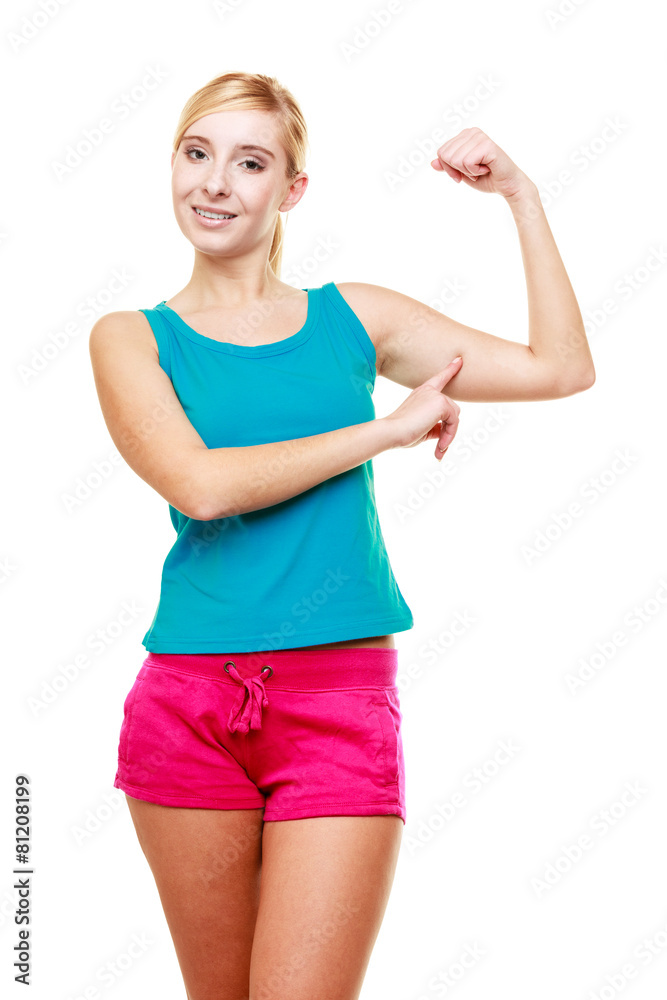 Young woman teen girl showing her muscles Young woman teen girl showing her muscles