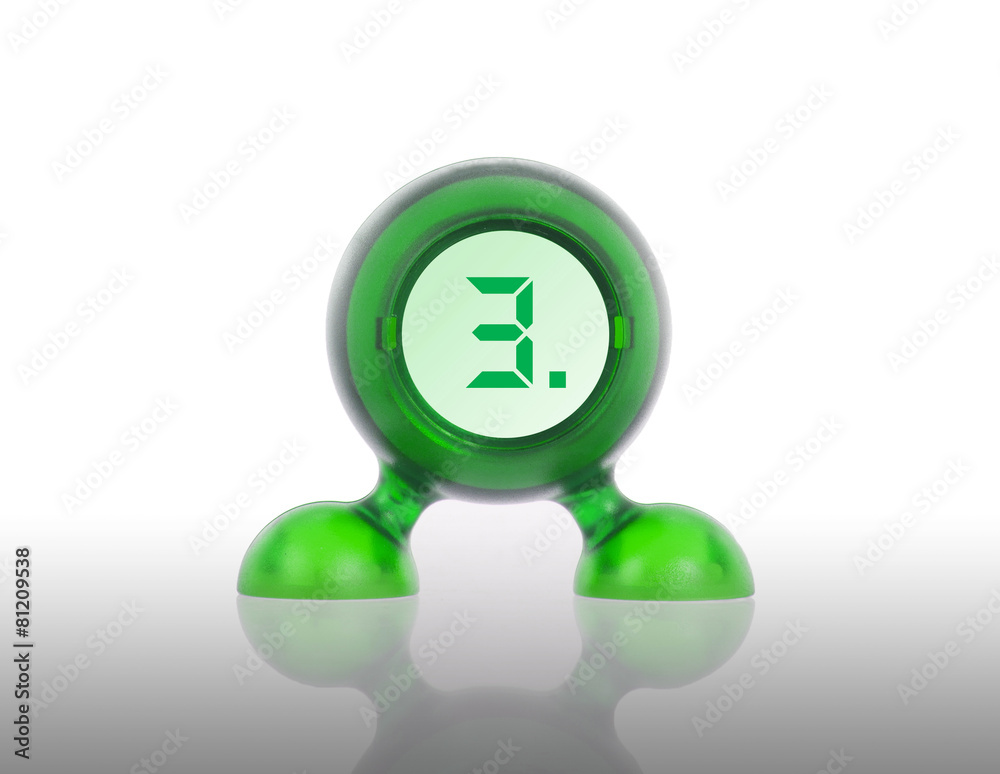 Small green plastic object with a digital display Small green plastic object with a digital display
