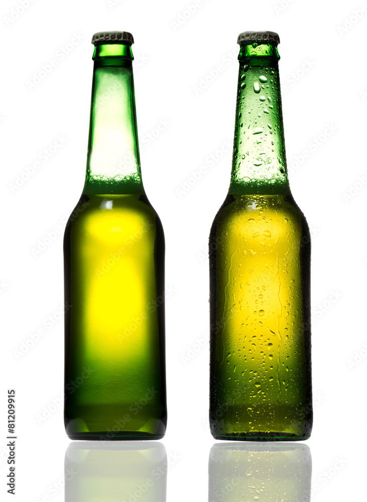 Bottles of beer with water drops on white background Bottles of beer with water drops on white background