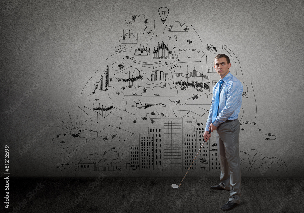 Businessman playing golf