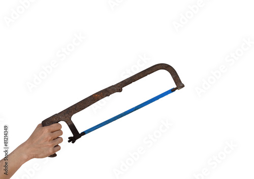 Old hacksaw in hand isolated over white background