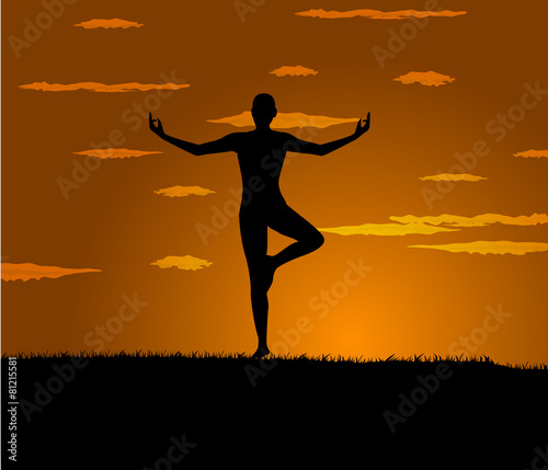 girl makes yoga exercise at the gloaming