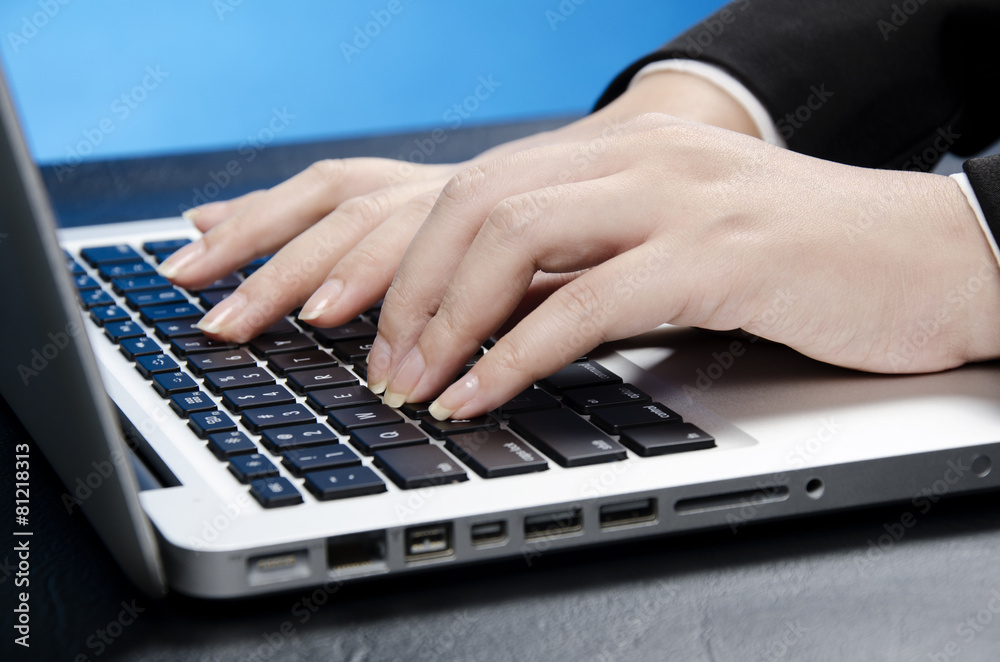 Office worker in discussion on laptop Office worker in discussion on laptop