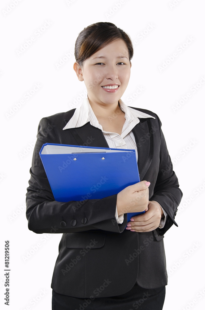 Businesswoman standing with document in hands Businesswoman standing with document in hands