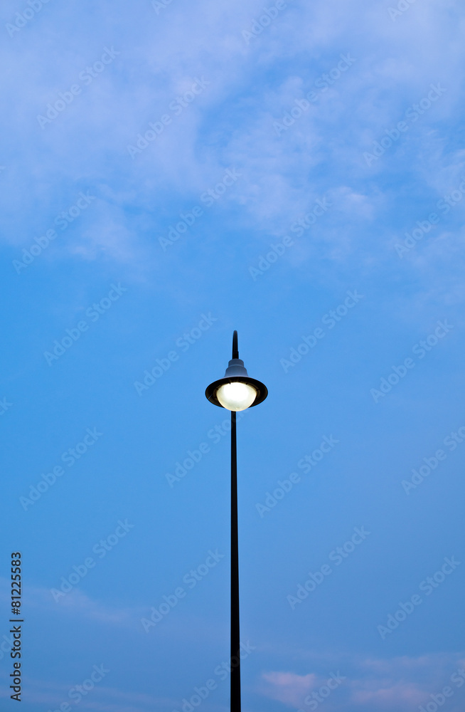 Street electric lamp on blue sky background Street electric lamp on blue sky background