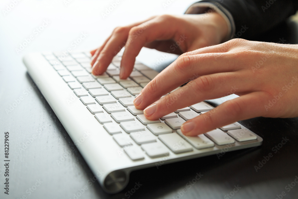 Female hands working at a keyboard/computer. Female hands working at a keyboard/computer.