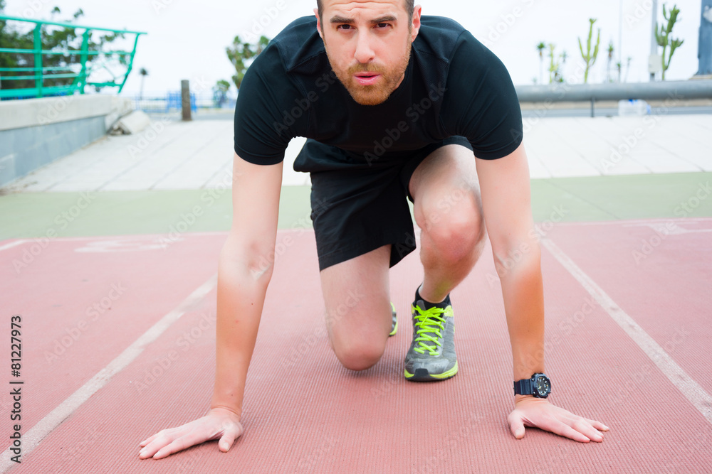 man ready to run on the track man ready to run on the track