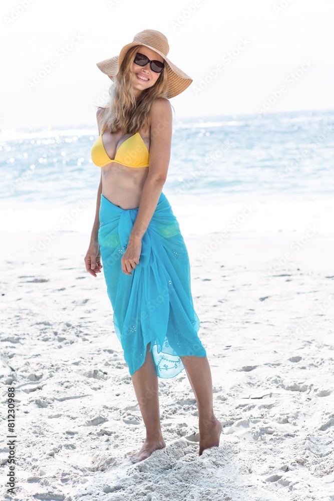 Smiling pretty blonde posing with sarong