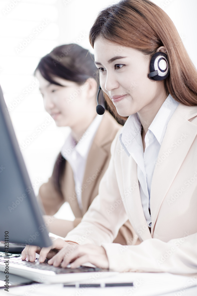 Asian women call center with phone headset Asian women call center with phone headset