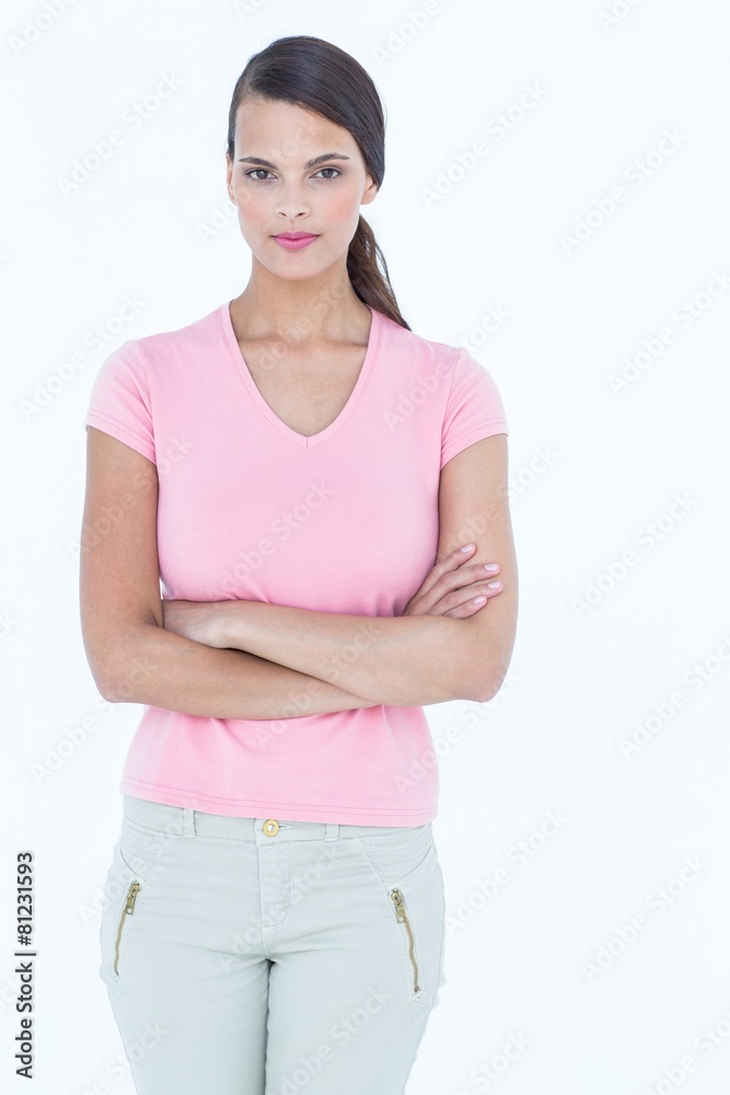 Serious woman looking at camera with arms crossed Serious woman looking at camera with arms crossed
