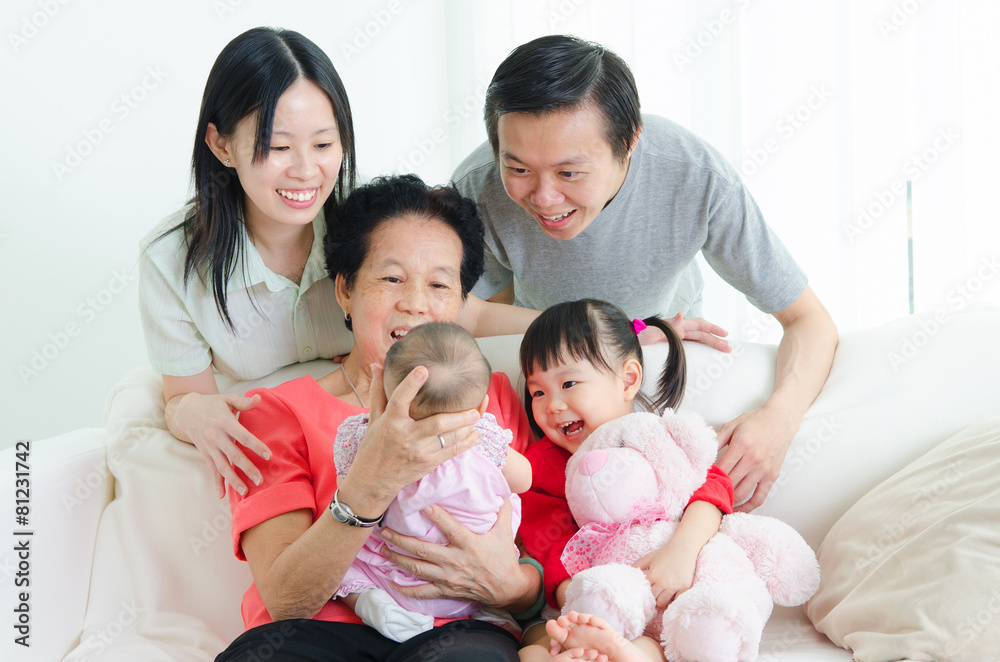 Asian senior woman hug her new born grandchild Asian senior woman hug her new born grandchild