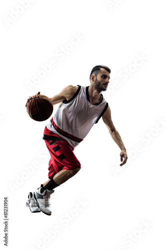 Isolated basketball player in action is flying high