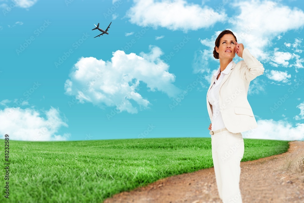 Composite image of thinking businesswoman Composite image of thinking businesswoman