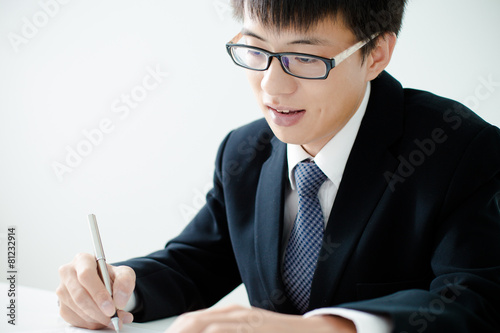 Business man signing a contract